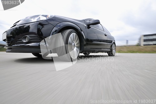 Image of Fast car moving with motion blur