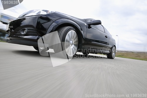 Image of Fast car moving with motion blur