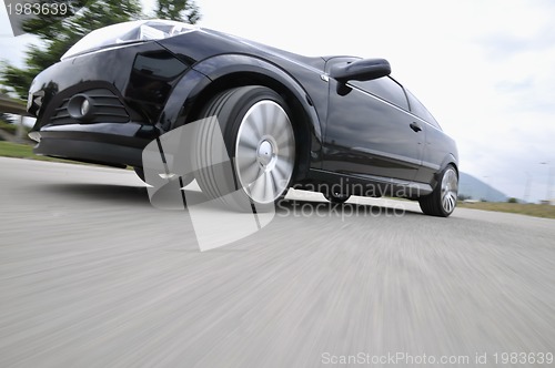 Image of Fast car moving with motion blur