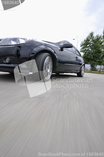 Image of Fast car moving with motion blur