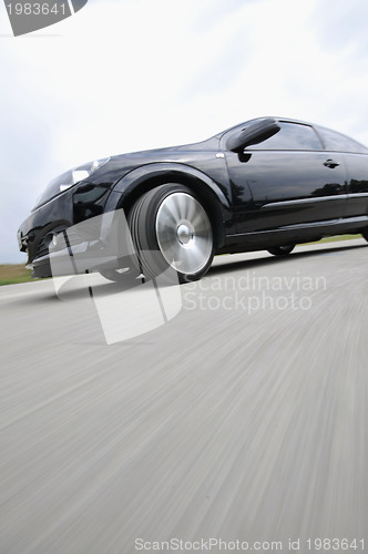 Image of Fast car moving with motion blur