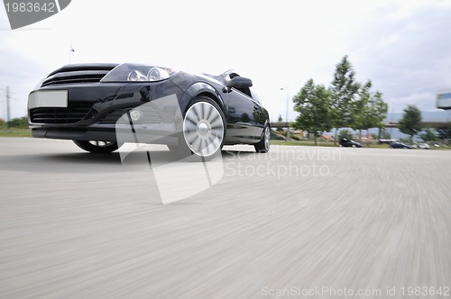 Image of Fast car moving with motion blur