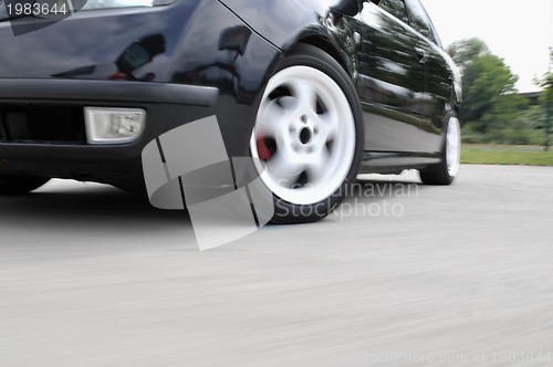 Image of Fast car moving with motion blur