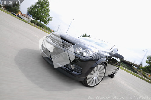 Image of Fast car moving with motion blur