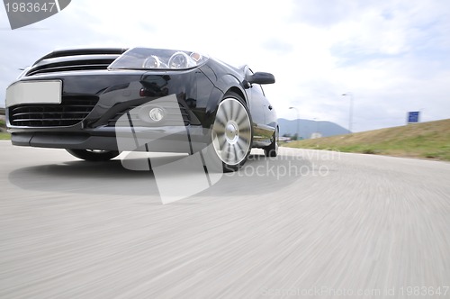 Image of Fast car moving with motion blur