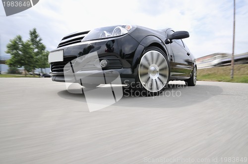 Image of Fast car moving with motion blur