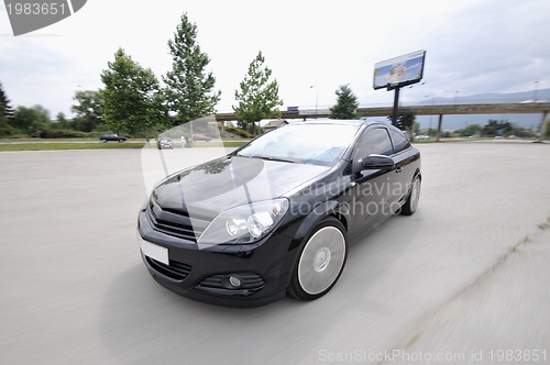 Image of Fast car moving with motion blur