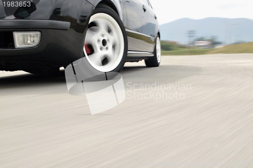 Image of Fast car moving with motion blur