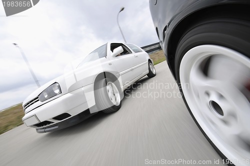 Image of Fast car moving with motion blur