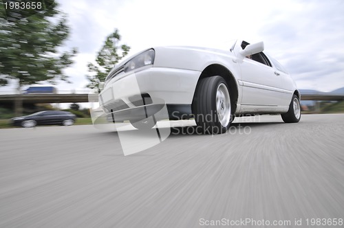 Image of Fast car moving with motion blur