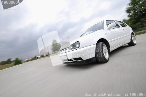 Image of Fast car moving with motion blur