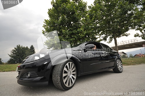 Image of Fast car moving with motion blur