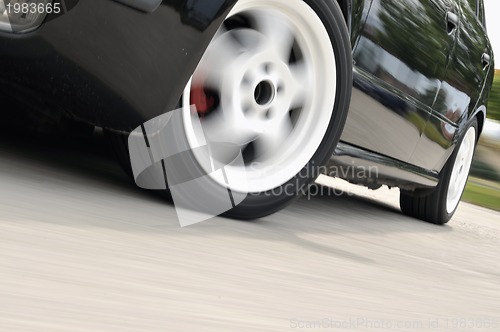 Image of Fast car moving with motion blur