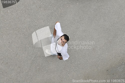 Image of young man looking up