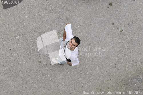 Image of young man looking up