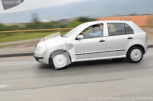 Image of Fast car moving with motion blur