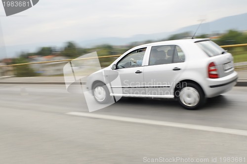 Image of Fast car moving with motion blur