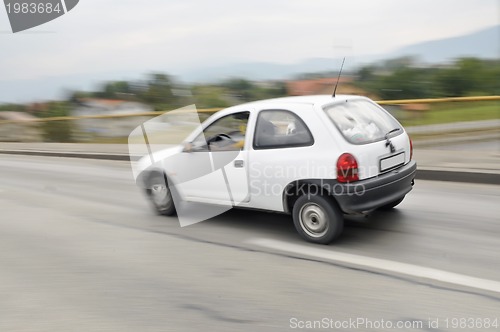 Image of Fast car moving with motion blur