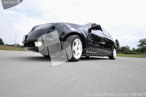 Image of Fast car moving with motion blur