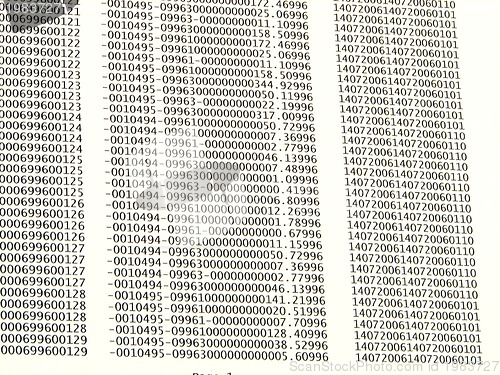 Image of database concept with printed and coded database records