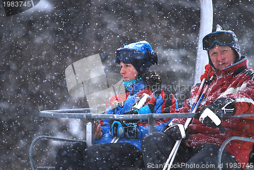 Image of winter fun on a chair lift