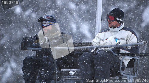 Image of winter fun on a chair lift