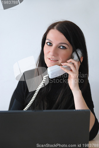 Image of young woman with laptop 