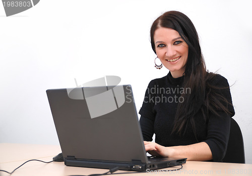 Image of young woman with laptop 