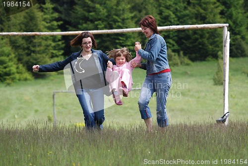 Image of happy girls running in nature