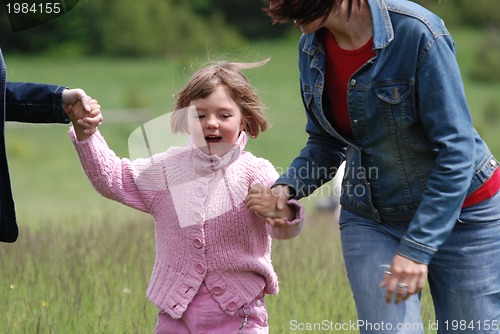 Image of happy girl running in nature