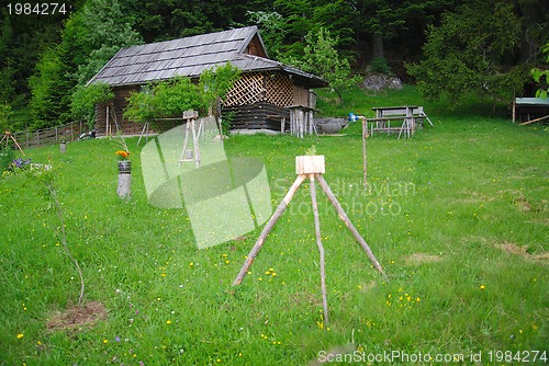 Image of lonely wooden house in forest