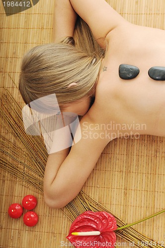 Image of Massage with hot volcanic stones 