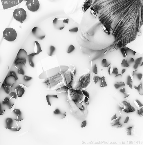 Image of woman bath flower