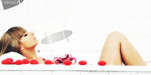 Image of woman bath flower