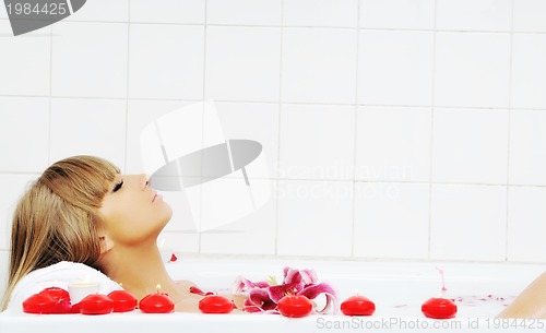 Image of woman bath flower