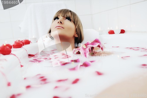 Image of woman bath flower