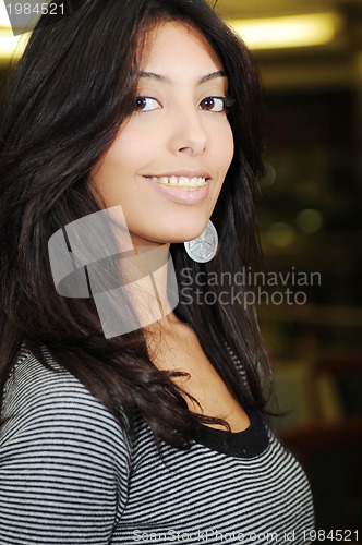 Image of young woman indoor
