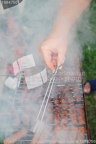 Image of sausages on grill