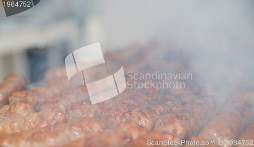 Image of sausages on grill