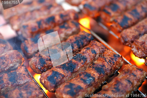 Image of sausages on grill