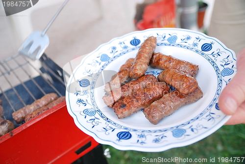 Image of sausages on grill