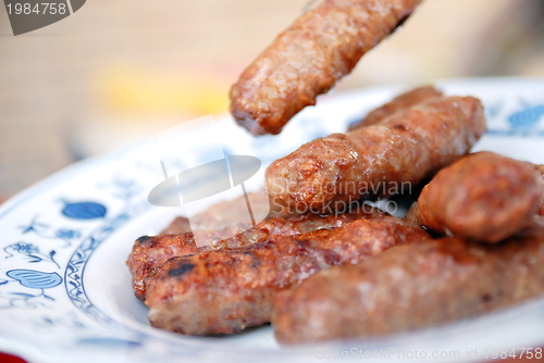 Image of sausages on grill