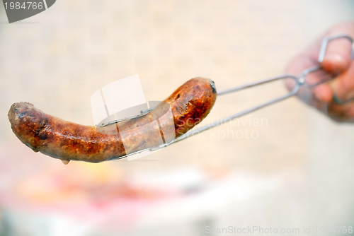 Image of sausages on grill