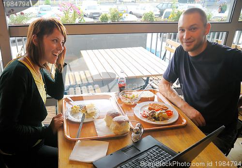 Image of happy couple at lunch 