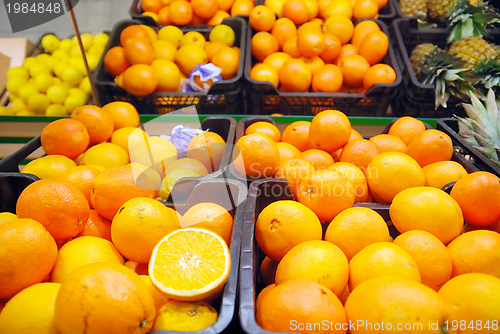 Image of fresh oranges in supermarket