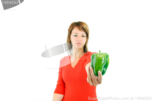 Image of pretty girl with pepper isolated