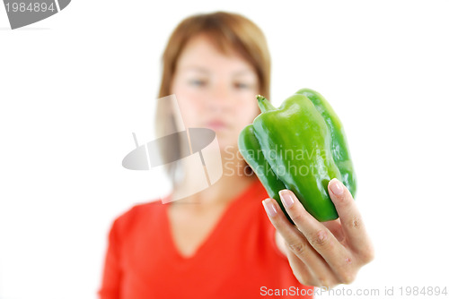 Image of pretty girl with pepper isolated