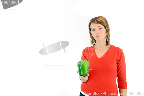 Image of pretty girl with pepper isolated