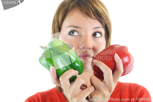 Image of pretty girl with pepper isolated