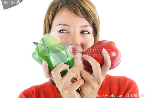 Image of pretty girl with pepper isolated